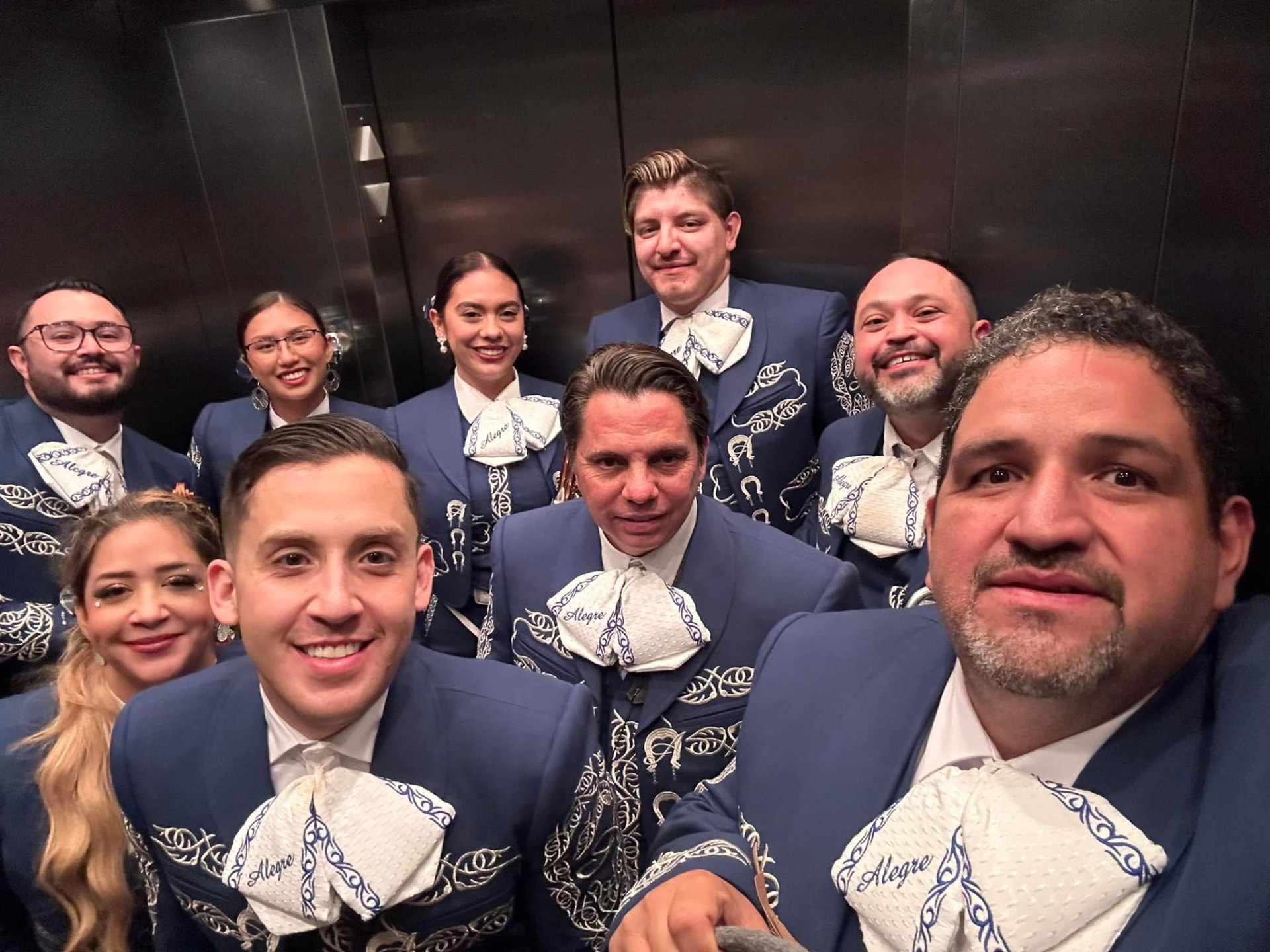 Mariachi Alegre in blue charro suits before a show